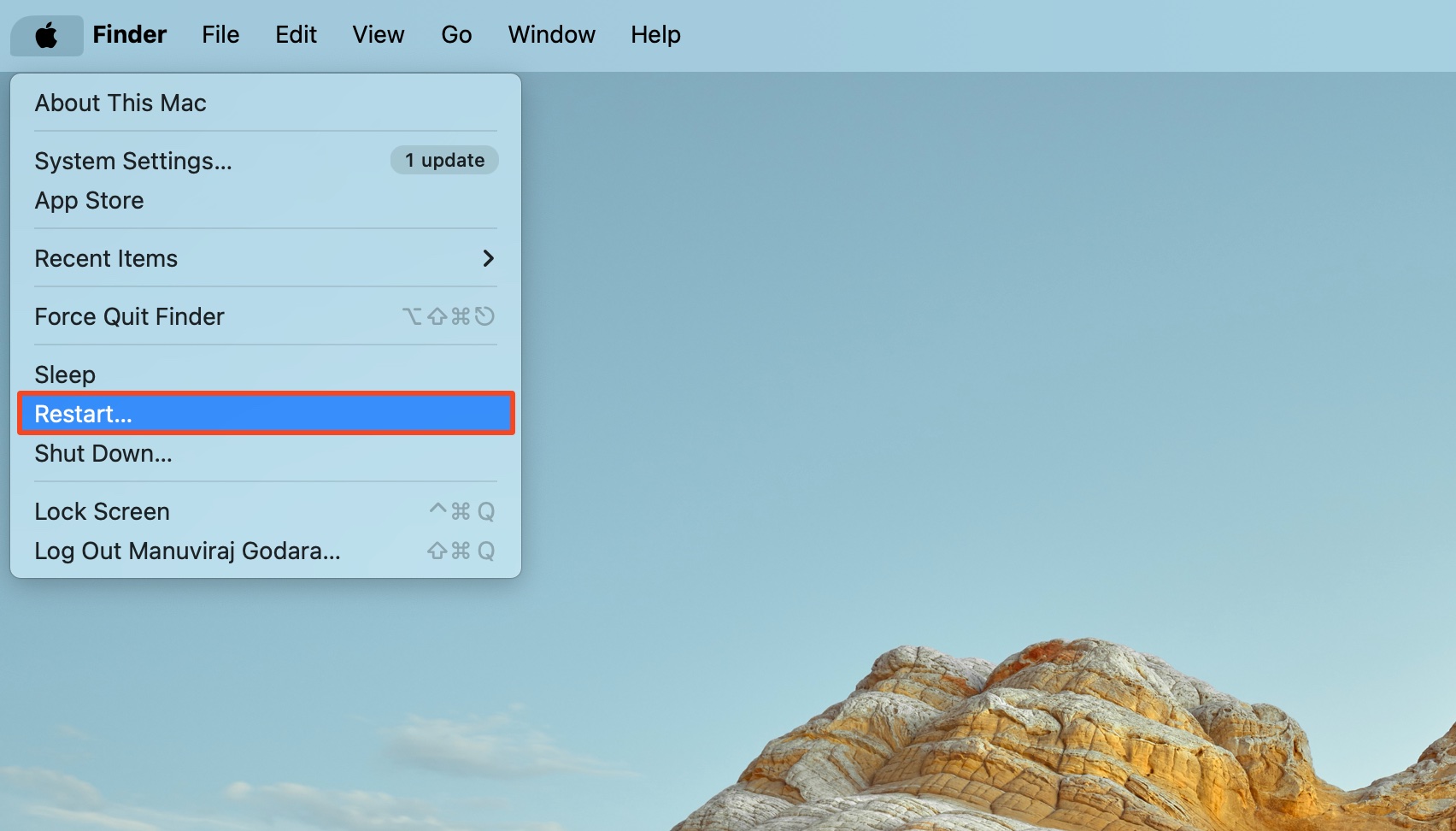 Restart option highlighted in the Apple Menu.