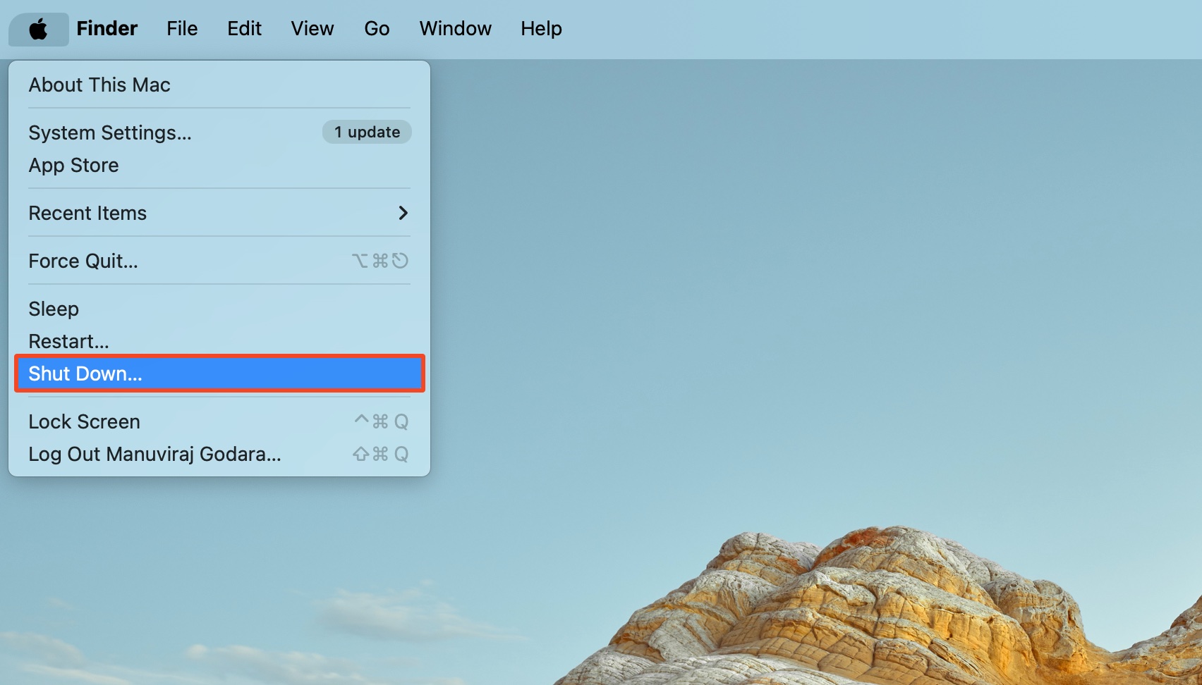 Shutdown option highlighted in Apple Menu.
