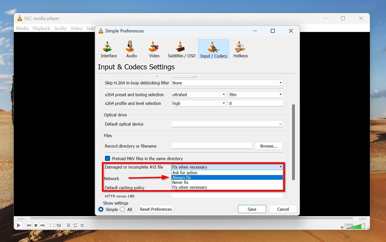 VLC settings window with 'Always fix' option selected for damaged AVI files.